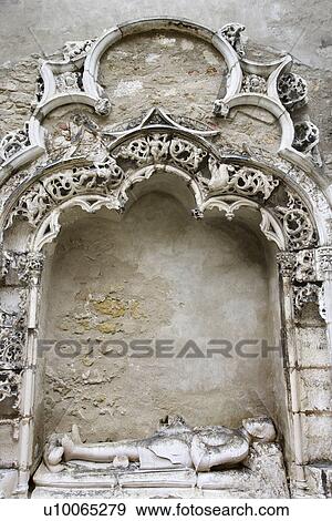 Stock Photo - Sculpture memorial of man in Igreja do Carmo, Lisbon, Portugal.. Fotosearch