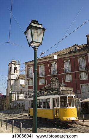 Street scene with trolley in Lisbon, Portugal. View Large Photo Image Stock Image - Street scene with trolley in Lisbon, Portugal.. Fotosearch