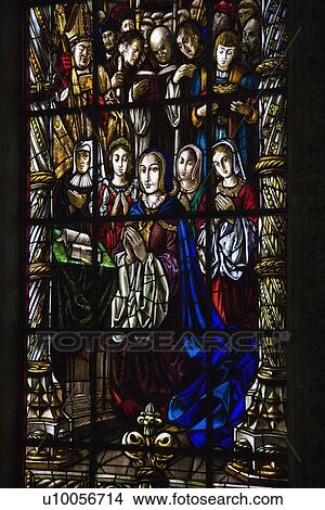 Sunlit religious themed stained glass window in Jeronimos Monastery in Lisbon, Portugal. View Large Photo Image Picture - Sunlit religious themed stained glass window in Jeronimos Monastery in Lisbon, Portugal.. Fotosearch