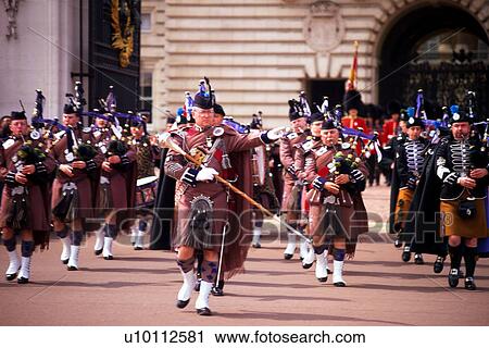 Stock Image - Changing of the guard, Buckingham Palace. Fotosearch