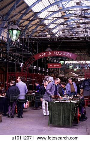 Stock Image - Covent Garden Apple Market Antique Stalls. Fotosearch