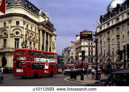 Stock Image - Red Doubledecker bus at Picadilly Circus. Fotosearch