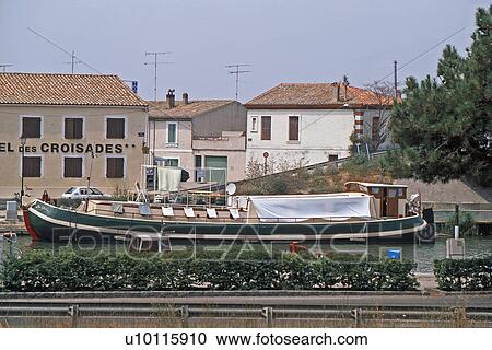 Aigues-Mortes -river barge View Large Photo Image Stock Image - Aigues-Mortes -river barge. Fotosearch