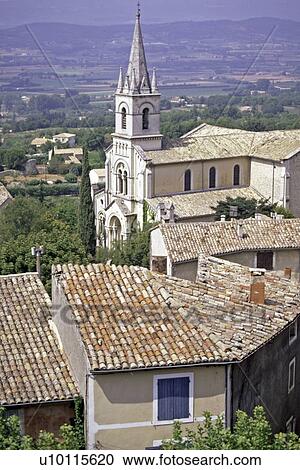 Stock Image -  Bonnieux - view of church from upper town. Fotosearch