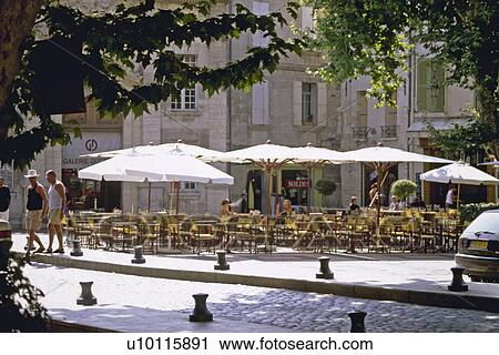 Stock Image - Early morning cafe in Avignon. Fotosearch