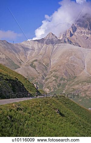 Stock Photo - Hautes Alpes - road view with motorbikes. Fotosearch
