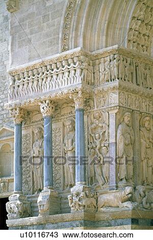 Stock Image - Arles - Eglise de Trophime detail of portal. Fotosearch