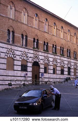 Stock Image - Siena - Piazza del Duomo-Episcopal palace. Fotosearch