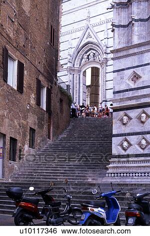 Stock Photograph - Siena - stairs connecting Baptistry to Portal of Duomo. Fotosearch