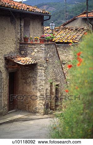 Entrance into old stone house with red tiled roof Tuscany, Italy View Large Photo Image Stock Image - Entrance into old stone house with red tiled roof Tuscany, Italy. Fotosearch