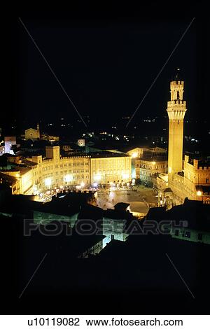 Stock Image - Siena Campo and Torre Mangia-night view. Fotosearch