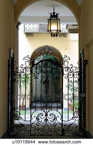 Picture - Fashion District-wrought-iron gate, courtyard. Fotosearch