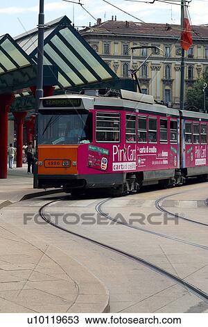 Stock Image - Tram in front of Train Station. Fotosearch