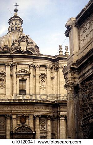 Stock Image - Church of Santi Luca e Martina and Arch of Septimus Severus on right. Fotosearch
