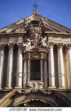 Stock Photograph - detail facade of Santi Vincenzo e Anastasio. Fotosearch