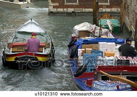 Barge passing parked barge on small canal. Barge delivering bottled water. View Large Photo Image Stock Image - Barge passing parked barge on small canal. Barge delivering bottled water. . Fotosearch