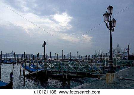 Stock Photo - Canal di San Marco with green bridge and lamp standard on quayside. Fotosearch