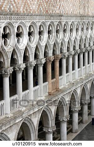Stock Photography - Colonnade on front of Doges Palace showing two pink columns. Fotosearch