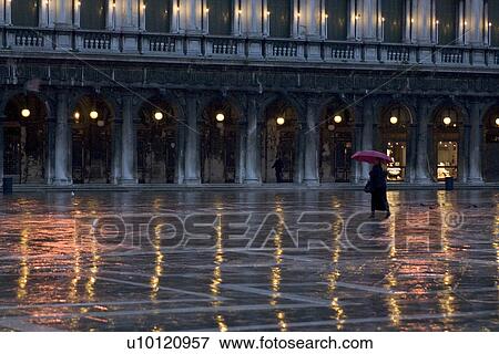 Stock Photo - Lighted arcade in St Marks Piazza. Fotosearch
