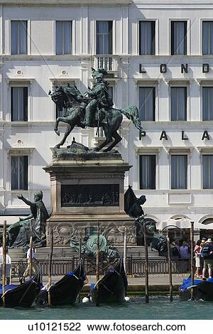 Stock Image - Statue of horseman in front of Londra Palace. Fotosearch