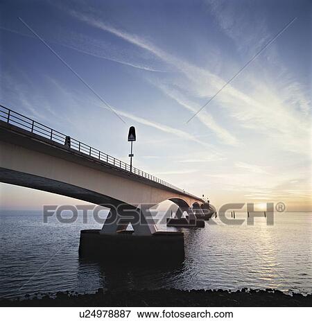 Stock Photo - A bridge over water in the Netherlands.. Fotosearch