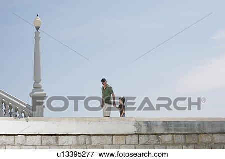 Boy & father walking shot from low angle View Large Photo Image Stock Photo - Boy & father walking shot from low angle. Fotosearch