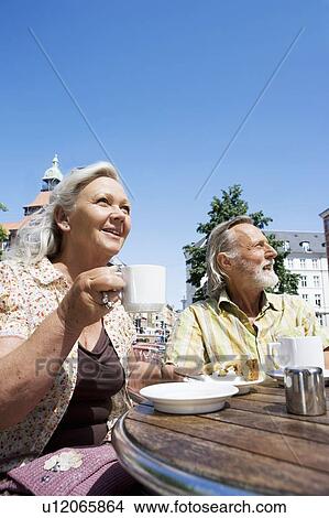 Couple drinking coffee View Large Photo Image Picture - Couple drinking coffee. Fotosearch