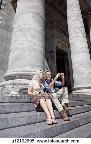 Stock Photography - Couple taking a picture. Fotosearch