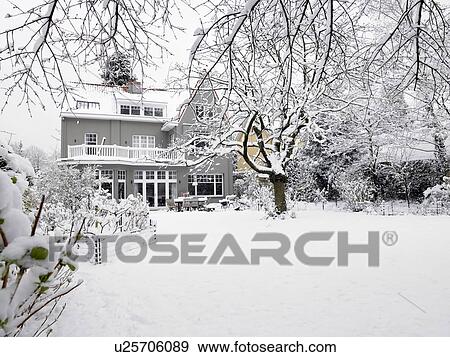 Stock Photo - House under snow. Fotosearch