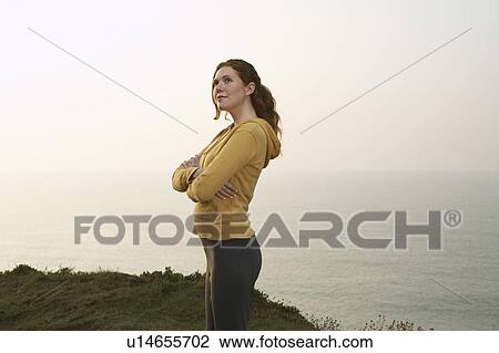 Portrait of woman on cliff top. View Large Photo Image Stock Image - Portrait of woman on cliff top.. Fotosearch