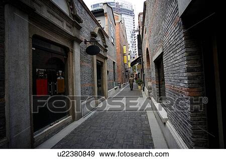 Stock Photo - China, Shanghai, an alley at Shiku Gate. Fotosearch