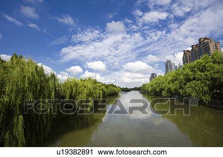 China, Shanghai, an river in front of residential district View Large Photo Image Stock Image - China, Shanghai, an river in front of residential district. Fotosearch