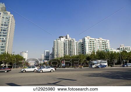 China, Shanghai, modern high-rise apartment buildings and street View Large Photo Image Stock Image - China, Shanghai, modern high-rise apartment buildings and street. Fotosearch