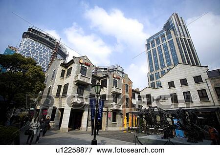 Stock Photo - China, Shanghai, old apartment buildings and cafe bars. Fotosearch