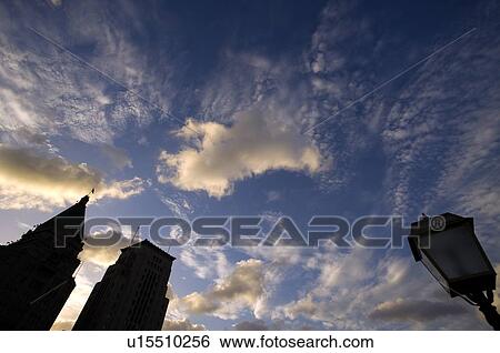 Stock Photograph - China, Shanghai, Sky over skyscrapers. Fotosearch