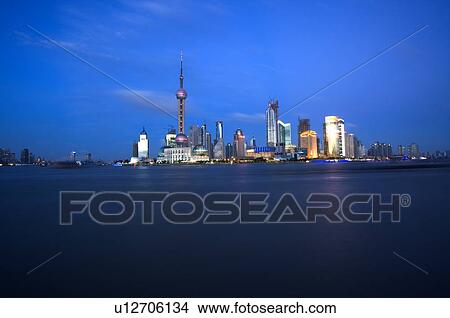 China, Shanghai, View of Oriental Pearl Tower and Pudong skyline from bund View Large Photo Image Picture - China, Shanghai, View of Oriental Pearl Tower and Pudong skyline from bund. Fotosearch