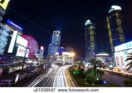 Stock Photo - China, Shanghai, Xujiahui at night. Fotosearch