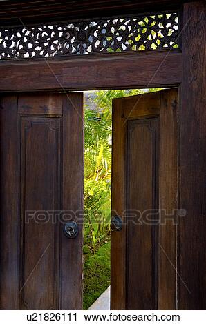 Stock Image - An open wooden gate. Fotosearch