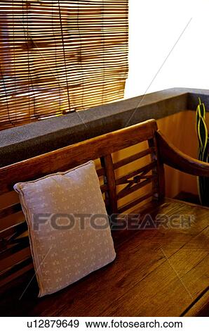 Stock Photo - Pew made by wood before bamboo screen. Fotosearch