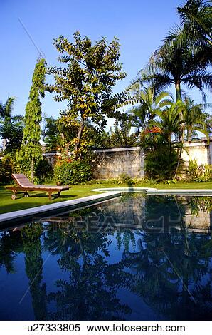 Stock Photography - Swimming pool in yard. Fotosearch