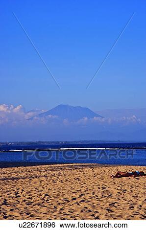 Women resting on beach View Large Photo Image Stock Photograph - Women resting on beach. Fotosearch