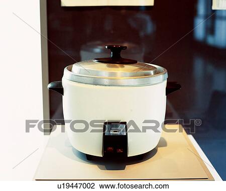 An antique rice cooker View Large Photo Image Stock Image - An antique rice cooker. Fotosearch