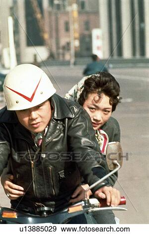Man and woman on motorcycle View Large Photo Image Stock Photo - Man and woman on motorcycle. Fotosearch