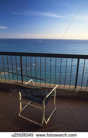 Stock Photography - Chair on Balcony, High Angle View. Fotosearch
