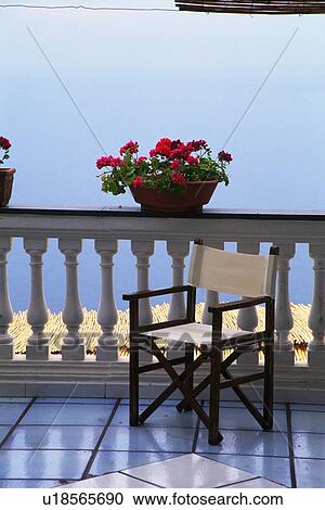 Chair on the Balcony View Large Photo Image Stock Image - Chair on the Balcony. Fotosearch
