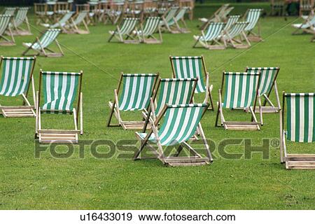 Stock Photo - Deckchair on Green Grass, Rear View. Fotosearch