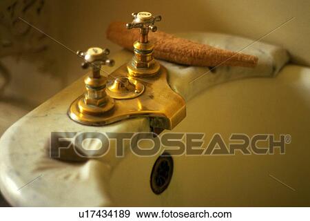 Stock Photo - Faucet on Bathtub, Close Up, Differential Focus. Fotosearch