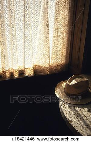 Hat on the Table by the Window, High Angle View View Large Photo Image Stock Photograph - Hat on the Table by the Window, High Angle View. Fotosearch