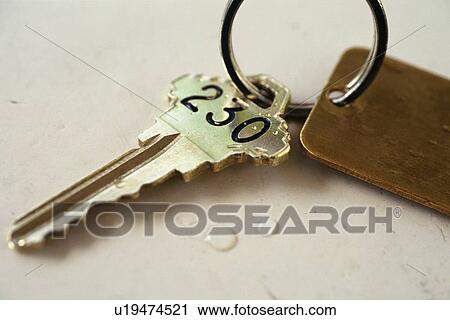 Stock Image - Hotel's Room Key, Close Up, High Angle View, Differential Focus. Fotosearch
