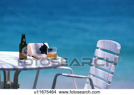 Picture - Table and Chair by the Sea, Close Up, Differential Focus. Fotosearch